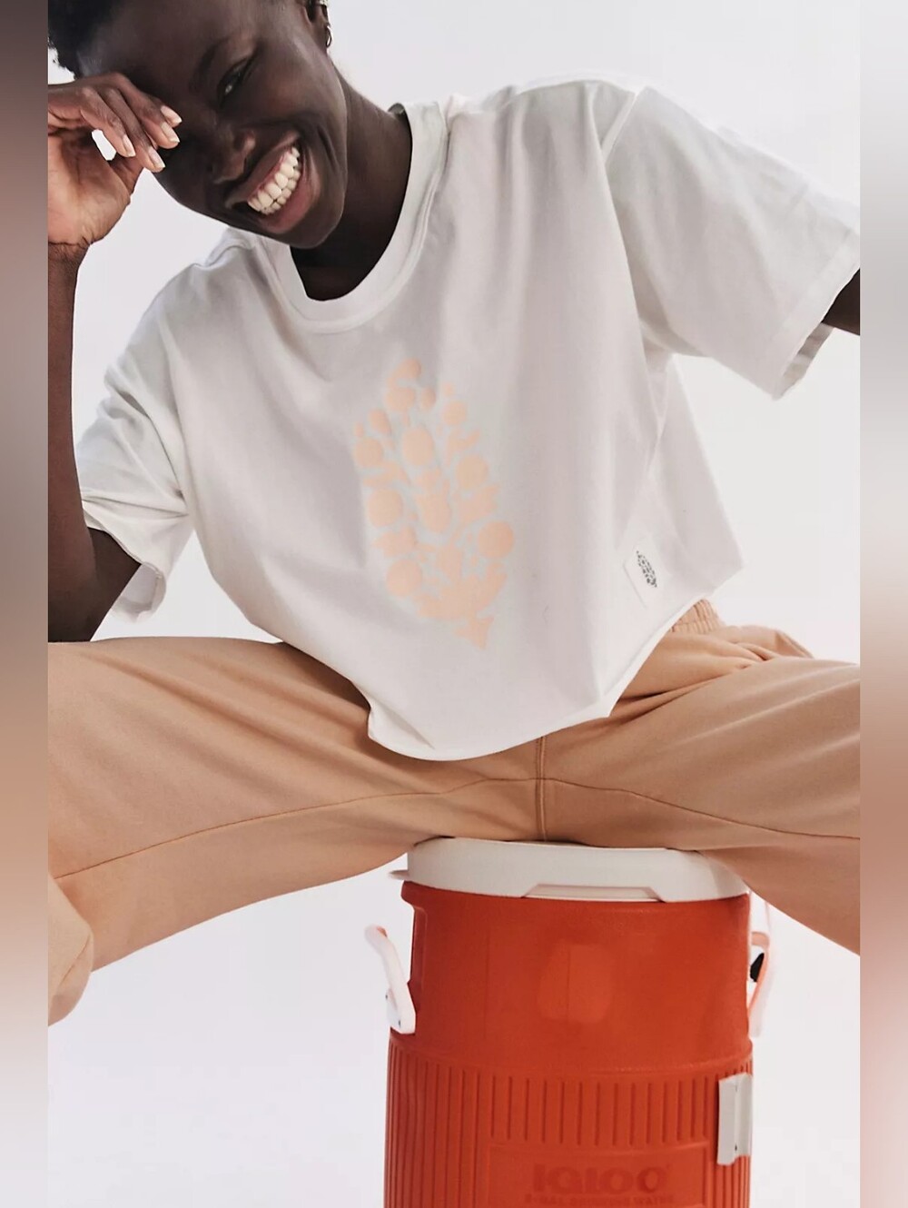 ❣️🪷NWT Free People FP Movement Inspire Buti Logo Tee in White Pastel Peach 🌙